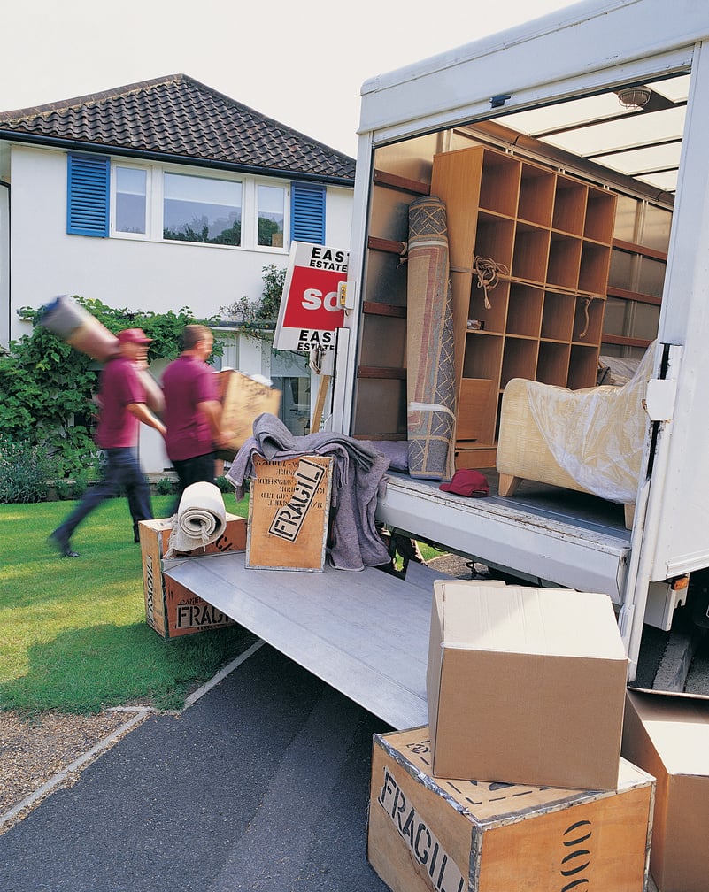 Movers Unloading Moving Van