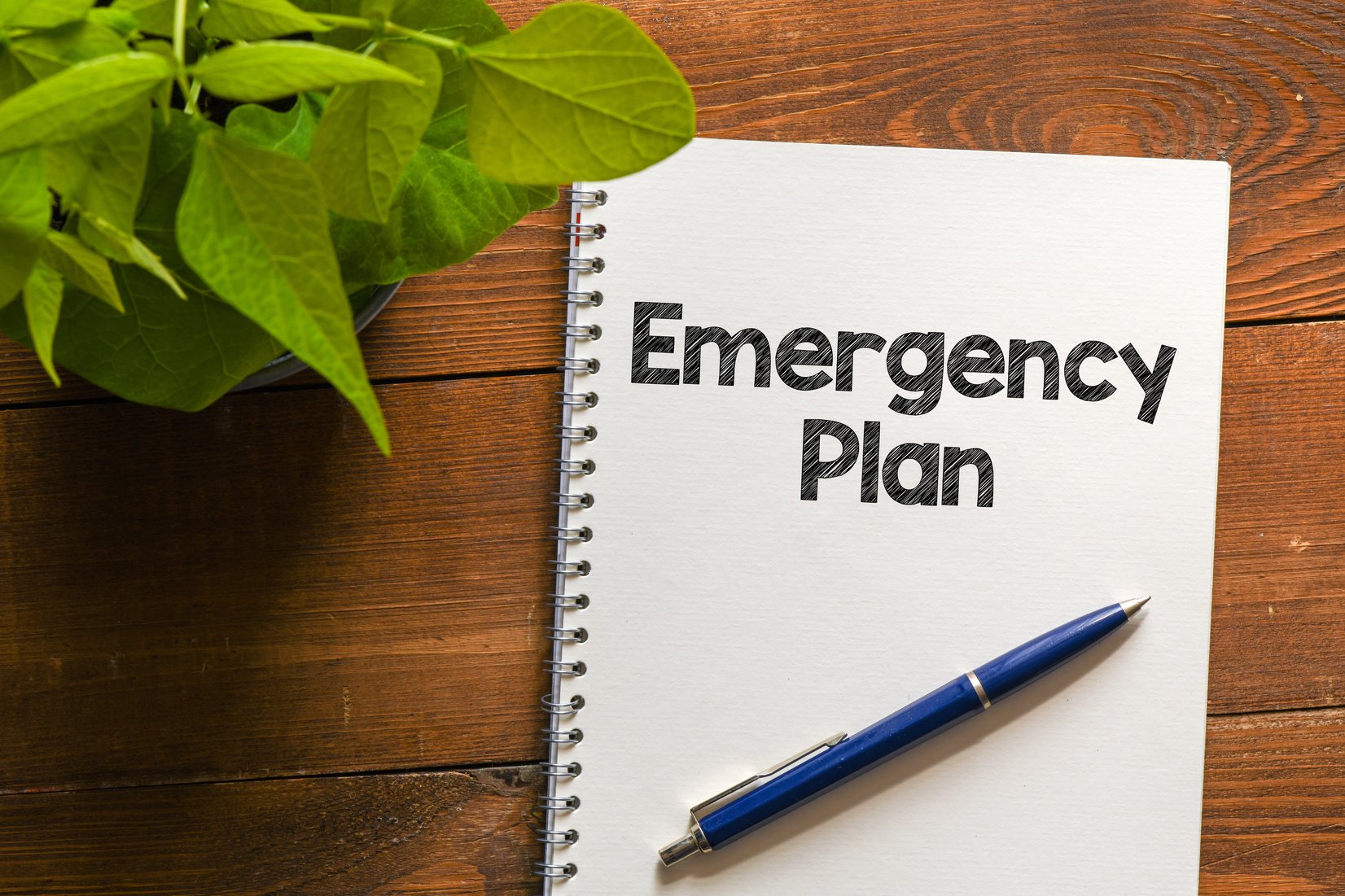 Emergency Plan Written on a Notebook